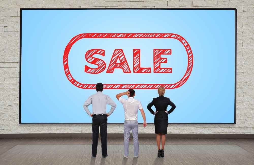 led signage saying "SALE"